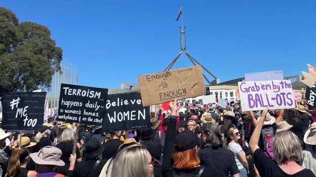Protest signs at the march 4 justtice outside parliament house